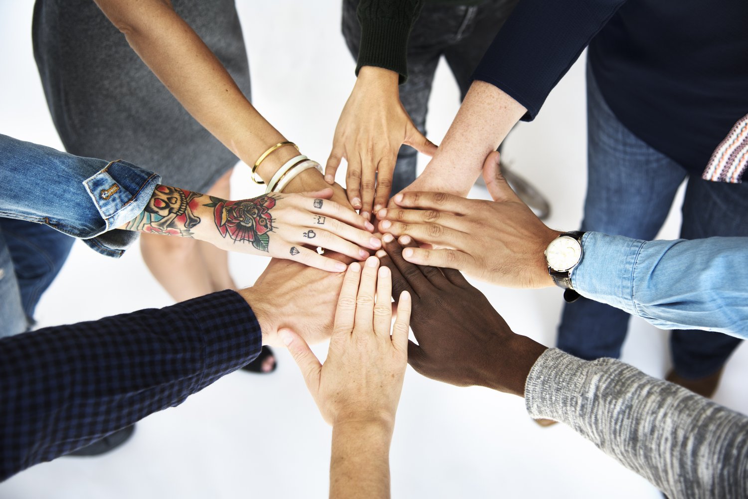 Diverse People Hands Together Partnership